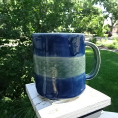 Deep Blue Mug with Green Design