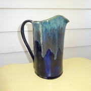 Pitcher in Blues and Black