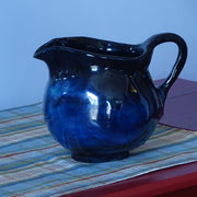 Blue and Black Pitcher